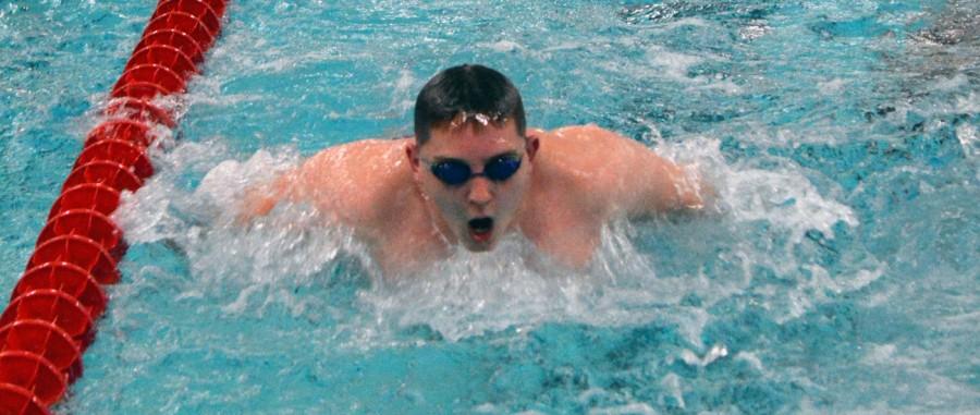 Junior Collin Harris swims the Butterfly stroke during a practice. Harris is a part of the boys relay team that is placing high in meets this year.