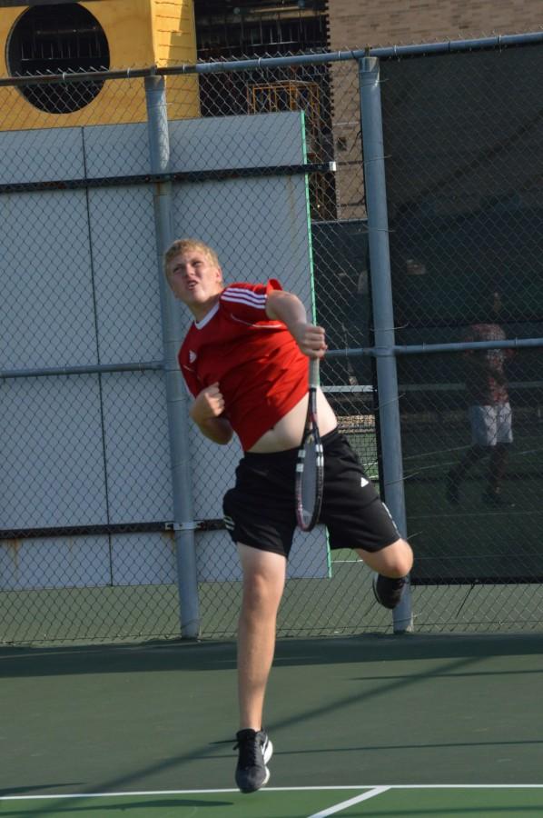 Senior+Chase+Cawthorne+follows+through+on+a+serve.+Cawthorne+fell+to+his+Decatur+Central+opponent+in+a+tie-breaker.