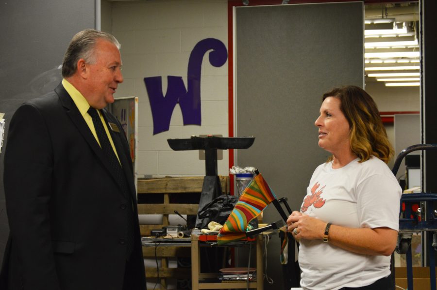 Associate Superintendent Patrick Mapes talks with Barb Whitlock on Thursday Nov. 10.  Mapes is now the Acting Superintendent of Perry Township.