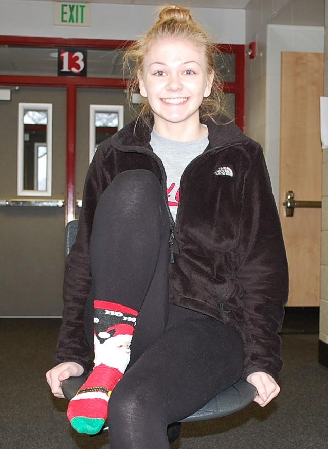 Pictured above is junior Alyssa Napier. Napier started collecting unusual socks over the summer and continues to buy more pairs.  