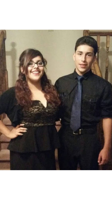 Sophomore Sebastian Perez (right) poses with his sister, Sandra Perez who is now a senior. During his first year at SHS, he attended his first dance. 