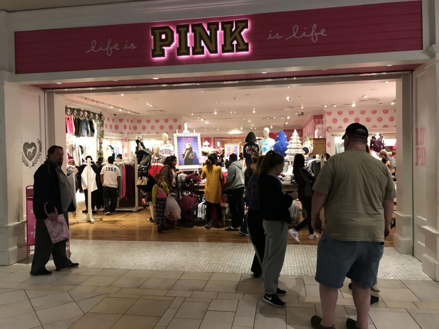 Customers stand outside of PINK at the Greenwood Park Mall. 