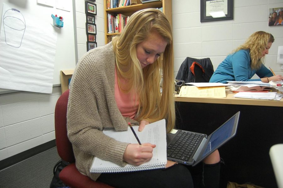 Junior Jacqui Bell works on government through Plato in English teacher Dawn Fowerbaughs room.
