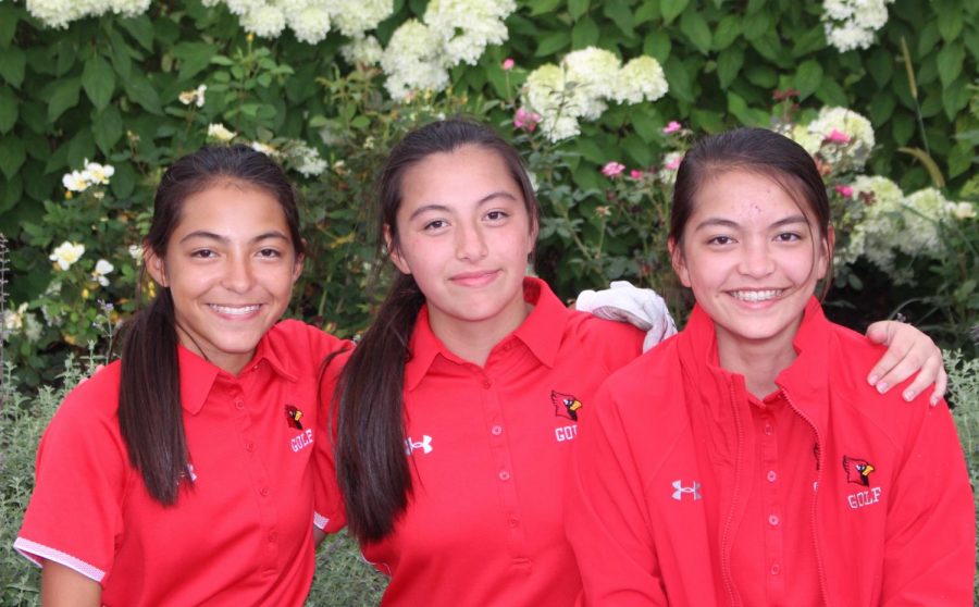 Naomi (left), Sophia (middle) and Annika Chan are triplets that are all a part of SHS girls golf team. These three dont let the competition of being on the same team affect their relationship as sisters. 