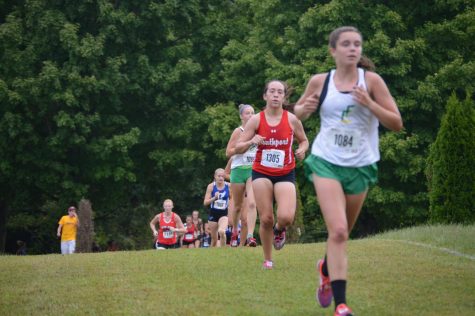 Junior Adrianna Frederick runs in the Columbus North Invitational on Sept. 1. She placed 19th overall in the meet.  