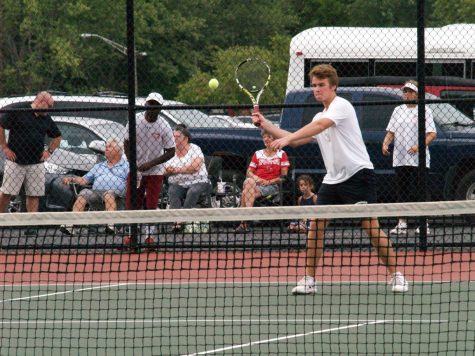 Senior John Gunderson plays in the SHS boys tennis game facing Perry Meridian. SHS won 3-2 on Sept. 6.