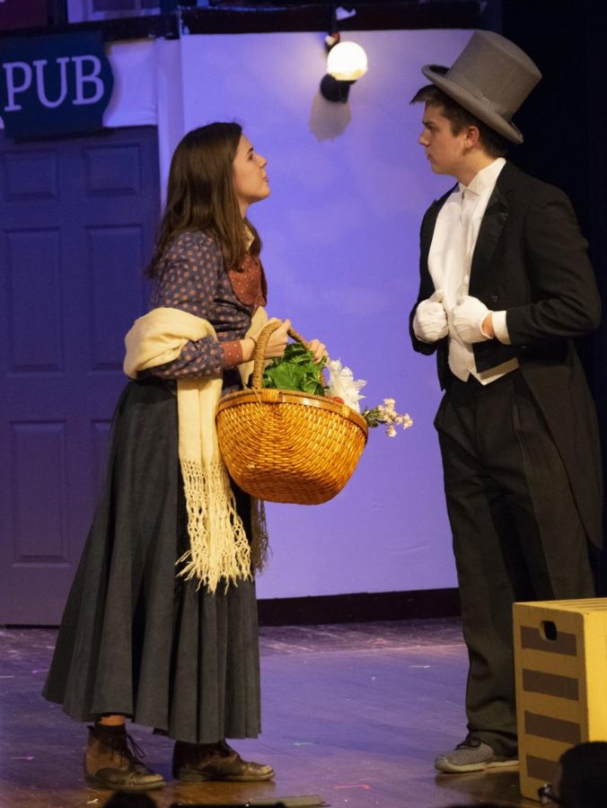 Junior Lilly Leslie left) acts on stage with junior Jacob Warfel during a My Fair Lady dress rehearsal on Nov. 12. The theater department will be presenting My Fair Lady Nov. 16-18 in the SHS auditorium.