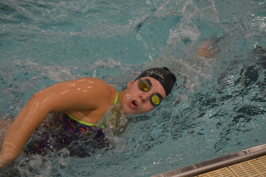 Junior Leslie Anderson swims at a practice on Dec. 17.