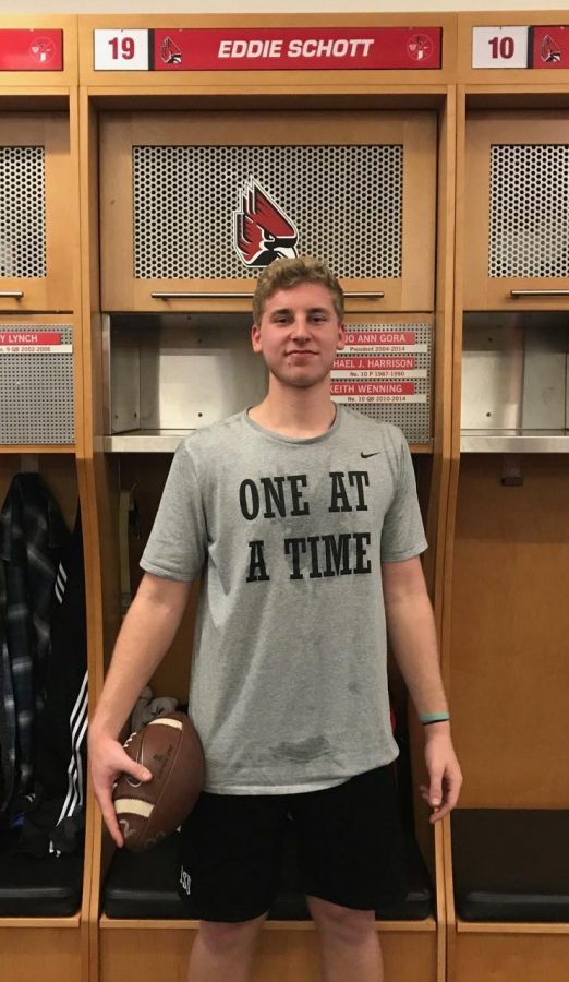 Eddie Schott stands in front of his football locker at Ball State University on Jan. 19. 