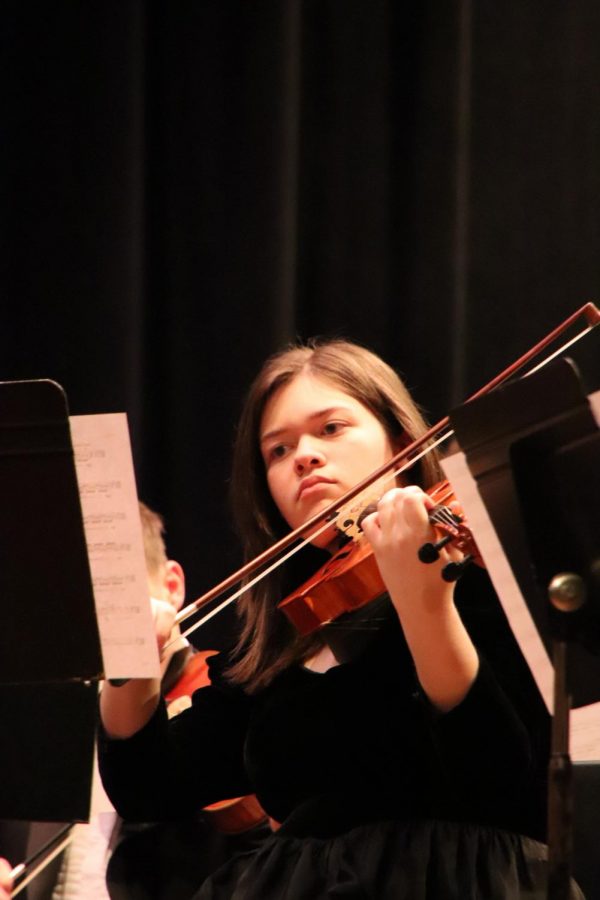 Joyanna Bracken plays viola at orchestra concert. Joyanna plays viola as well as piano.