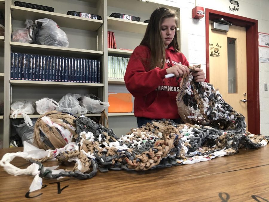 Senior Makayla Maxwell works on a mat. This is the Human and Social Services students end-of-the-semester project.