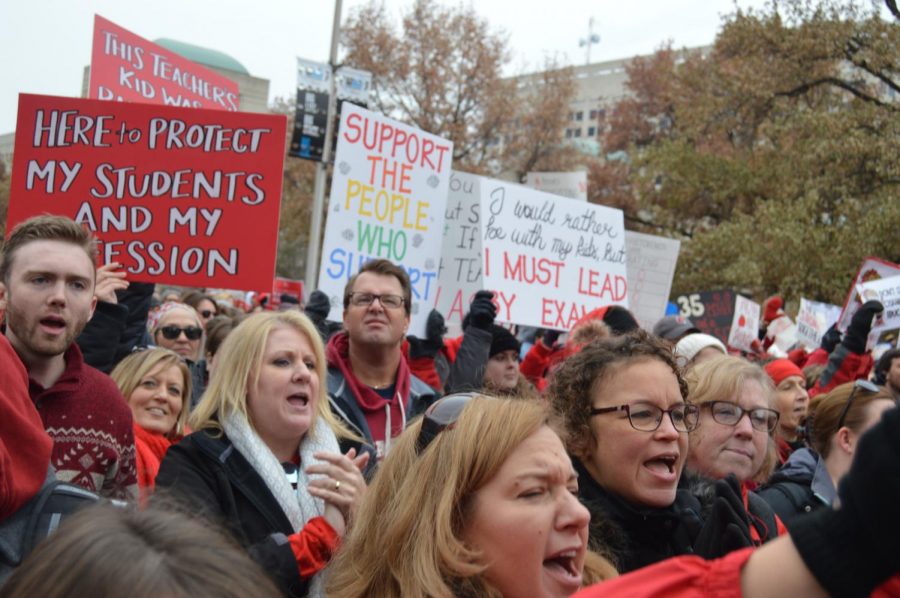 SHS teachers, along with educators from across the state, march around the Statehouse. The march was the second half of the rally, following live music and speeches.