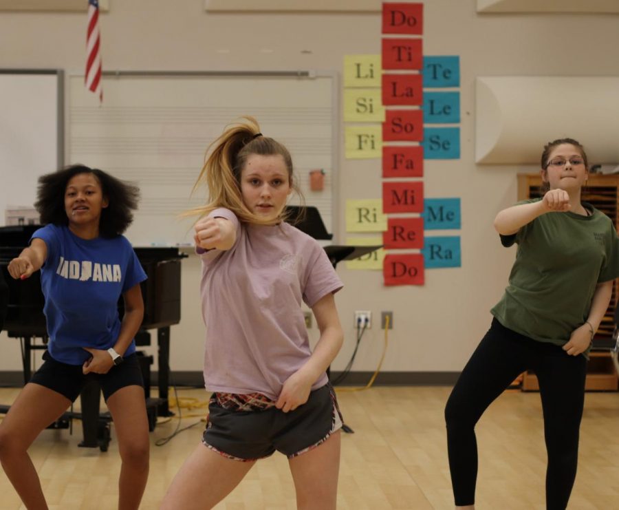 Freshman La’Quera Williams, junior Madison Baker and freshman Joshlynn Tanner dance during practice on Feb. 20. The dance team has practiced almost every day after school to prepare for nationals. 