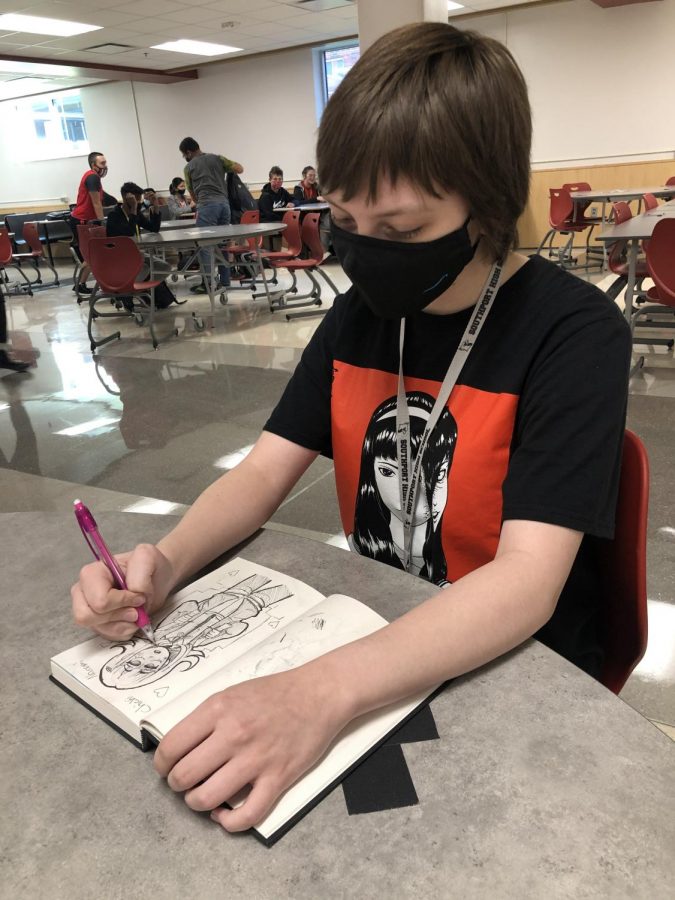 unior Heidi McMullen draws one of her characters during her lunch period on Sept. 25. McMullen says that drawing calms her nerves. 