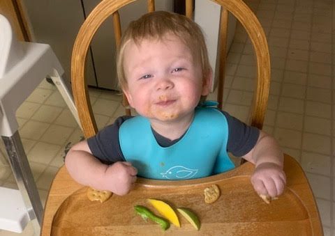 Science teacher Rachel Brunsells son, Parker is munching on some vegetables. Shes encouraging him to eat foods that nourish his body.