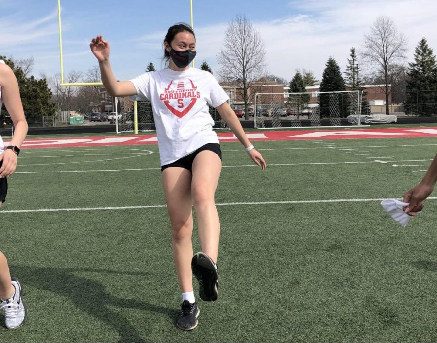 Sophomore Jackie Coy warms up before track practice. Track is just one of the many activities Coy has dedicated herself to.