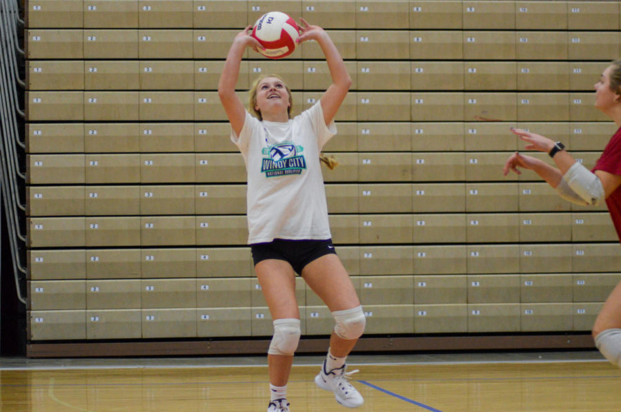 Chafin sets up her teammate with a set during practice