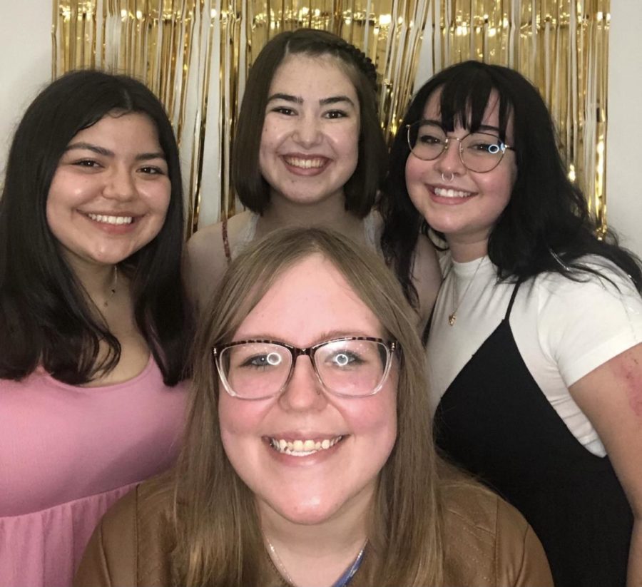 Senior Taylor Hill (bottom middle) is at the 20-21 Journal staff banquet. She says the staff both last year and this year are like family to her.