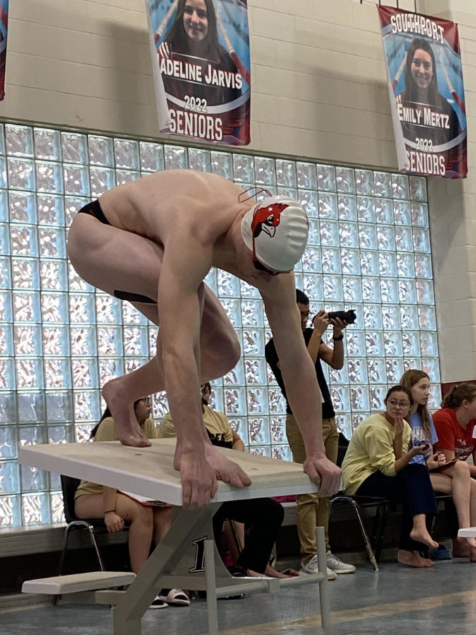 Senior+Clark+Wilson+gets+ready+to+dive+into+the+pool+for+his+race.+Clark+ended+up+getting+third+in+all+three+of+his+races+during+the+Cardinal+Classic.