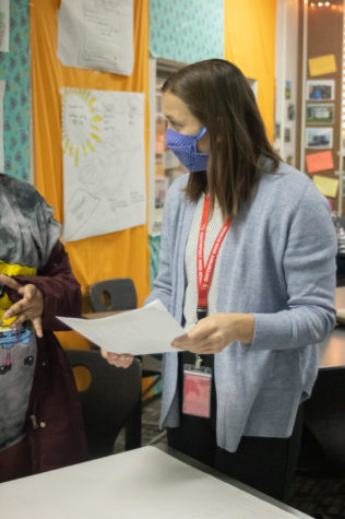 Science teacher Rachel Frantz helps students complete their project. She often organizes unorthodox project for her students. 