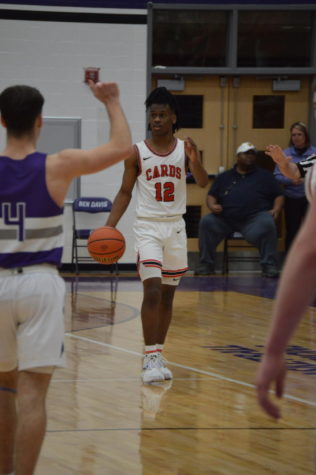 Junior Keyon Miller dribbles down the court in the win over the Falcons on Friday, March 4. Miller led the team in scoring during the game tallying 19 points.