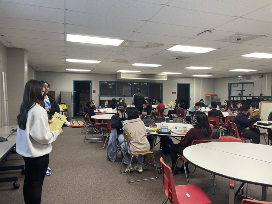 Mentors in the Latinx program volunteer to explain the ice breaker activity to the students on Feb. 25. The program is mostly run by mentors. 