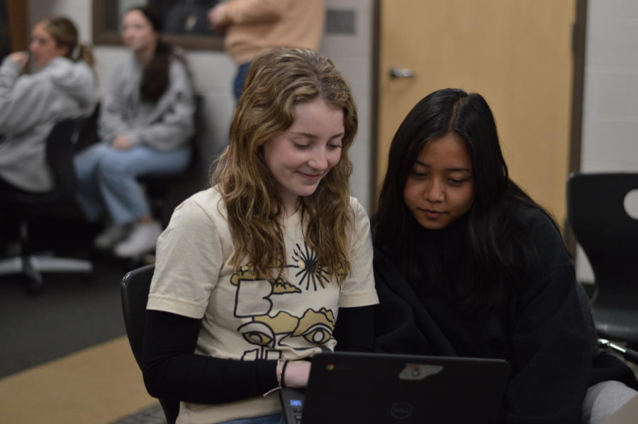 Junior Olivia Graphman and Sophomore Rin Diki work on a spread for Anchor. They will serve as Editor-in-Chief and Co-Editor-in-Chief, respectively.