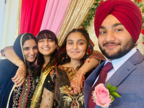 Sophomore Mohit Baidwan, both her older and younger sisters and her cousin attend a wedding on August 2021. This is one of the rare moments where Baidwan is dressed in her traditional clothing.
