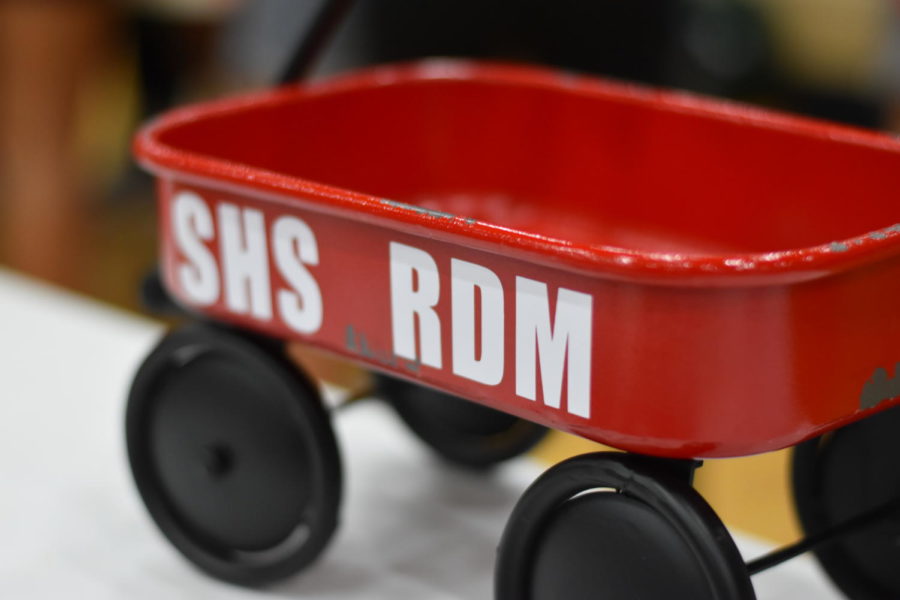A wagon with SHS RDM on the front of it at one of the booths at 2021-2022 RDM on April 22. 
