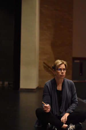 Roberts talks with students about Zombie Prom production during Technical Theatre class on Tuesday, October 4. She checked in 
on multiple students during this period. 