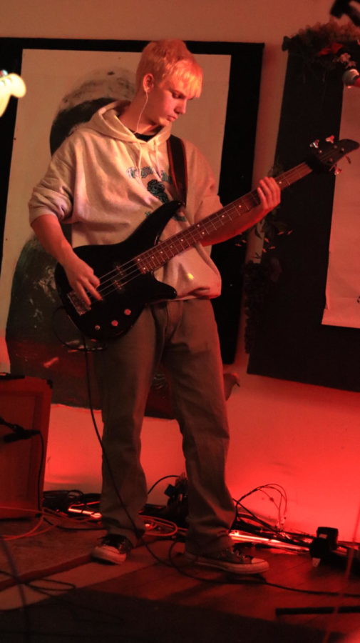 Ryder Harris plays bass at his bands concert on Dec. 8. 