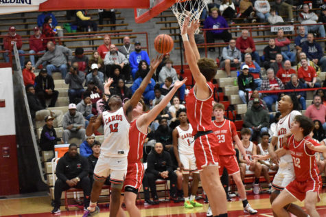 Senior Keyon Miller goes up for the layup on Dec. 10 during the Forum Tip-Off Classic at SHS. The Cards lost this game against Crown Point 59-65.