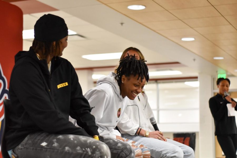 Indiana Fever guard Kelsey Mitchell laugh during their question session in the SHS cafeteria on Feb. 1. Mitchell and her teammates gave advice to female athletes from SHS and Perry Meridian.