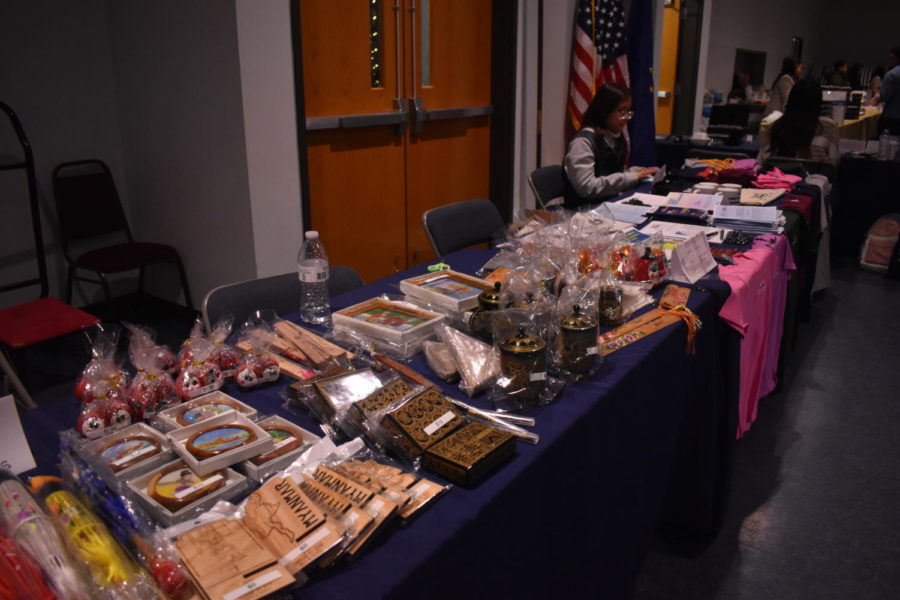 The BACI hosts a fundraiser table that sells BACI merch and Burmese items on Feb. 11. Volunteers help the BACI with managing the program as well.