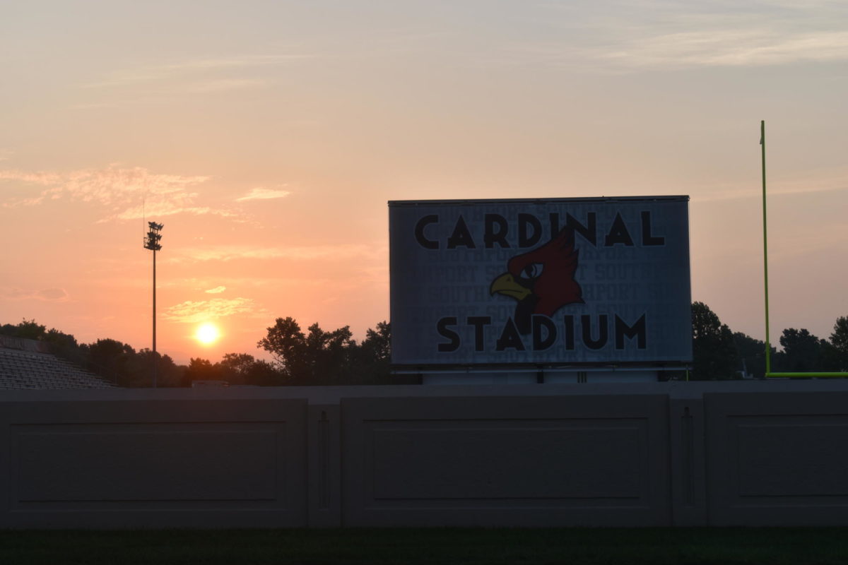 The sun rises over Cardinal Stadium on the morning of Aug. 25. The high temperature for that day was 94 degrees Fahrenheit, with a low of 79 degrees Fahrenheit.