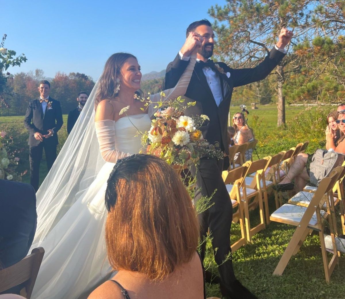 Athletic director Nick Stevens walks with his wife down the aisle at his wedding on homecoming weekend in Vermont. (photo contributed by Nick Stevens)