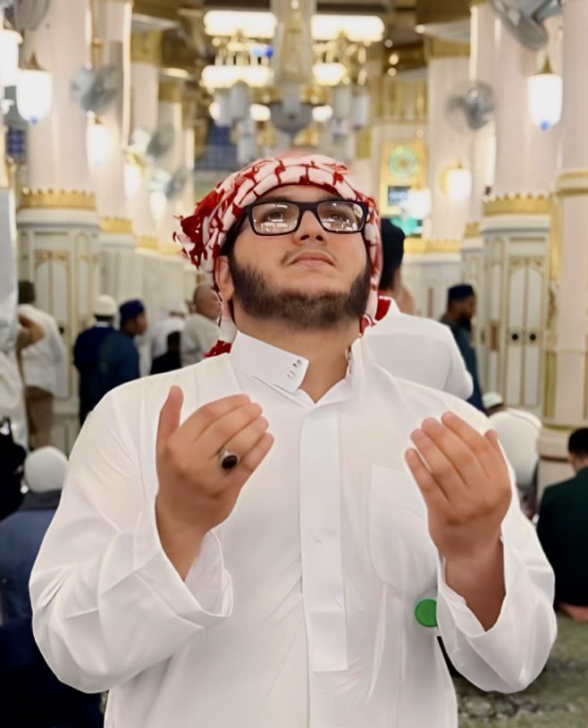 Senior Tamer Alsalloum prays in the
Prophet’s house in Medina, Saudi Arabia on Oct. 20. In his community, they pray by raising their hands.
Photo contributed by Alsalloum