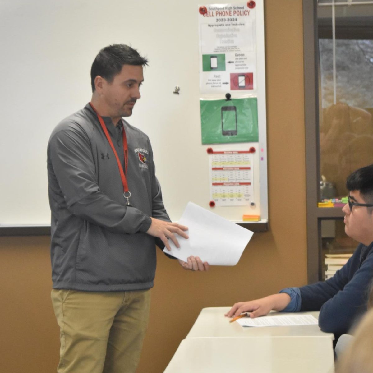 English teacher Brent Bockelman helps students prepare for finals on Dec. 18. Bockelman is one of the master teachers whose paychecks will benefit from the grant.