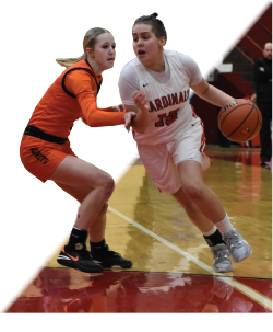 Bennett dribbles around a Beech Grove player to get to the basket during the game. The team lost 28-53, ending their season.