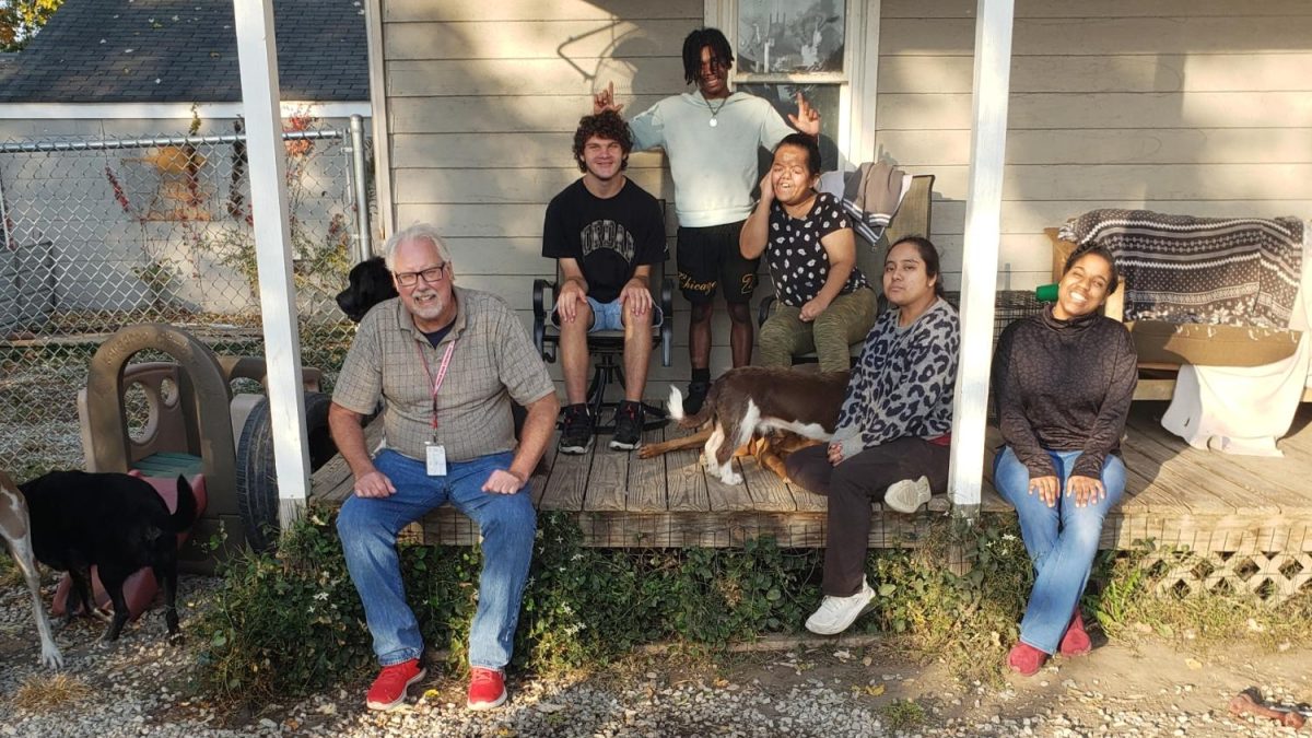 CIP students spend the day at Happy Hounds daycare to play with dogs. (photo contributed by Jennifer Karushis)