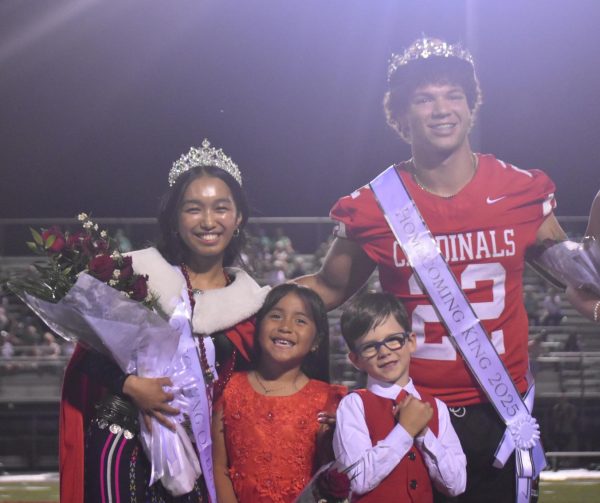 Homecoming Queen Lucy Len Dim and Homecoming King Riley Matlock pose for a photo with junior court members Sophia Najera and Sam Fritz.