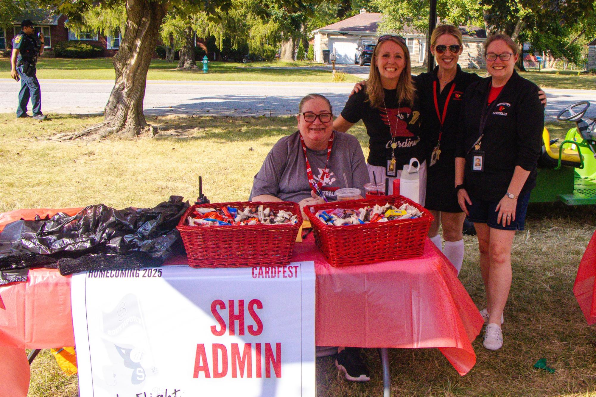 Office manager Alicia Tasker poses for a photo with Instructional coaches Ammie Hultman, Courtney Worley and Tiffany Grant during Cardfest on Sept. 19. Tasker served SHS for 15 years.