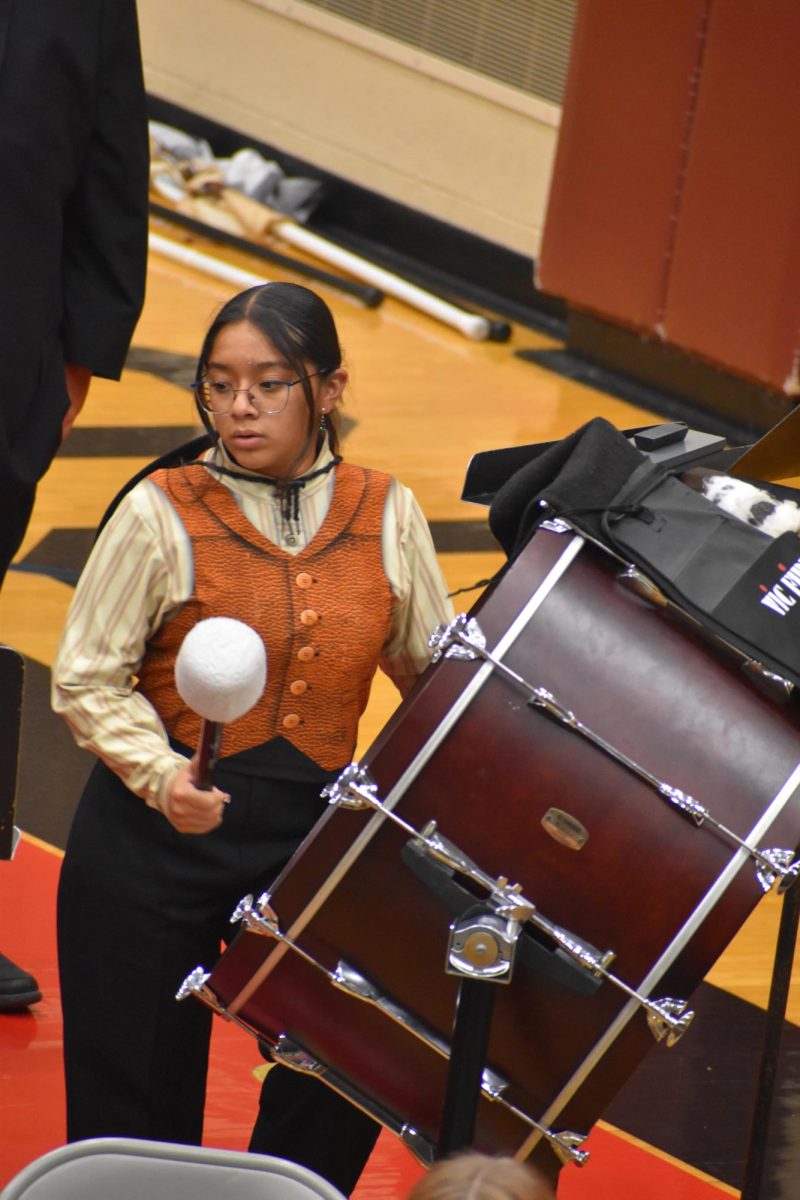 Eighth grader Leila Jimenez Ruiz plays the concert bass drum to the side. Ruiz is also a part of the marching band.
