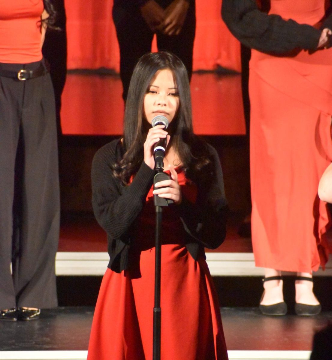 Junior Ding Noi sings her solo in Premium Blend's first song, "This Christmas." Noi was the second person to perform a solo during the song.