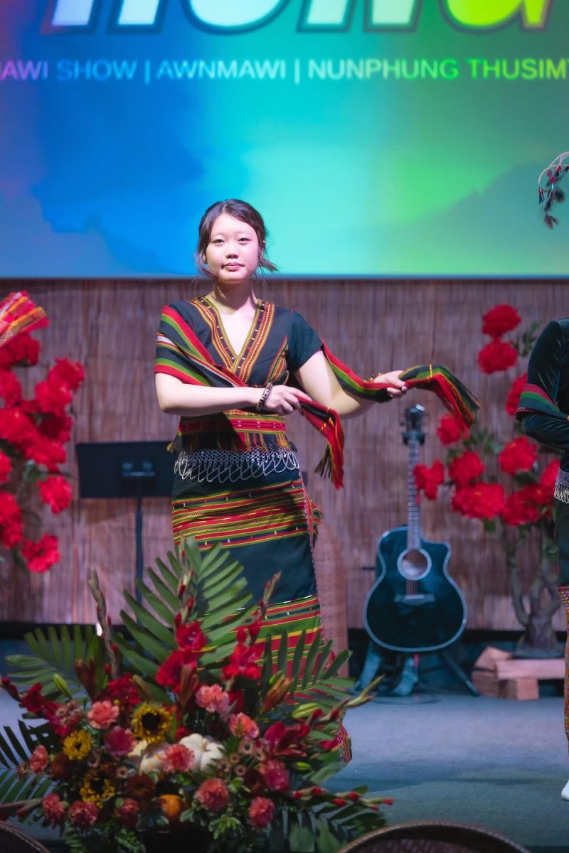 Senior Laura Cin performs a dance with a group during her church's Culture Night on Oct. 25, 2025. 