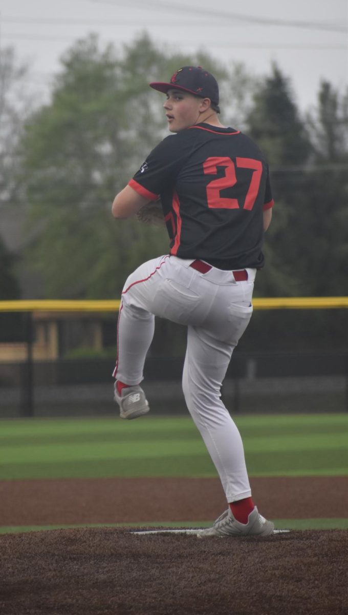 Starting pitcher and junior Dylan Pearcy throws a fastball. The cards remained 0-0 at the top of the third inning.