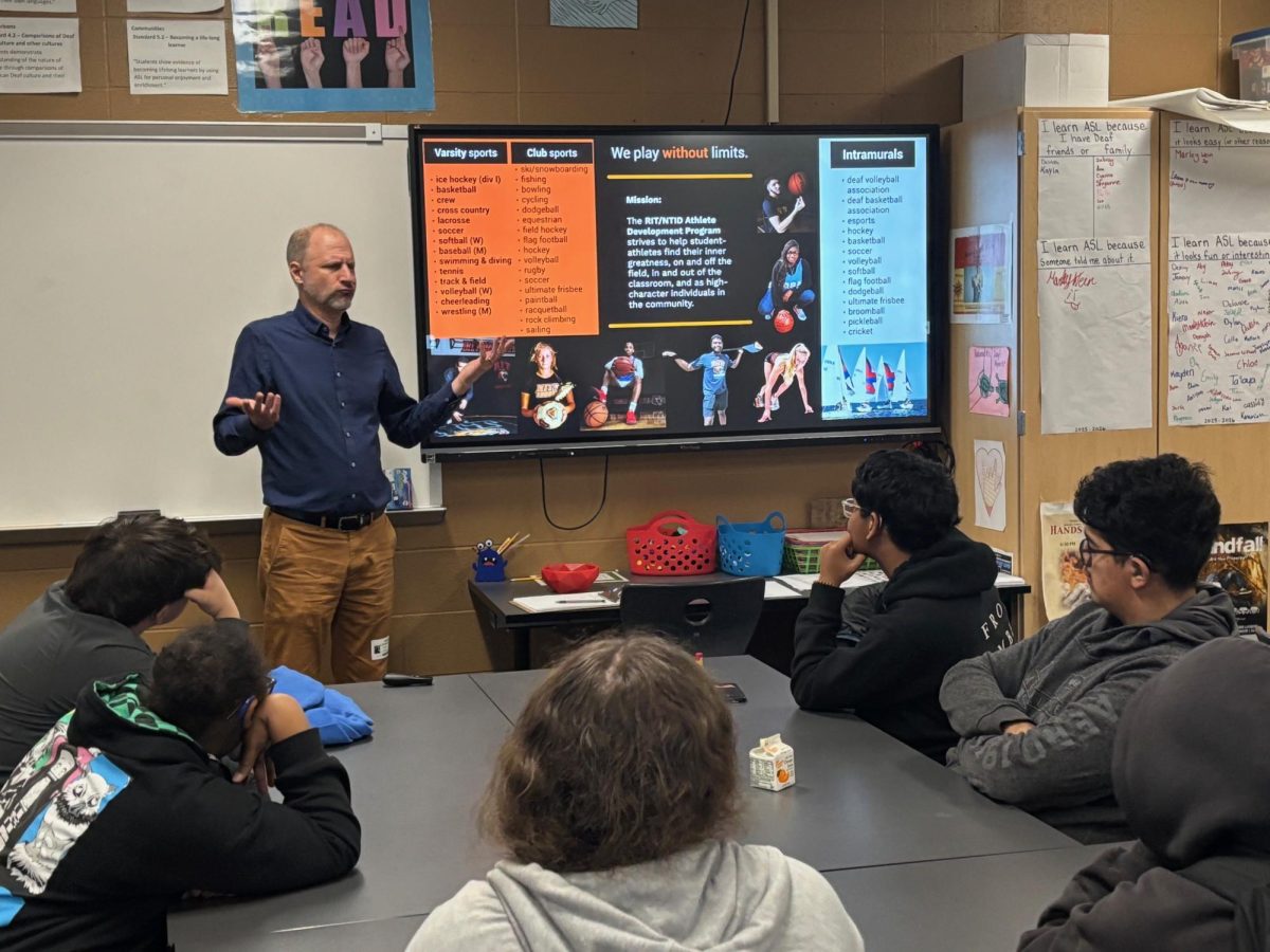 Rick Postl, Director from Rochester Institute of Technology (RIT) meets with Deaf and Hard of Hearing students. RIT is a college in Rochester, N.Y. that specializes in DHH programs. 
Photo provided by Jill Maude