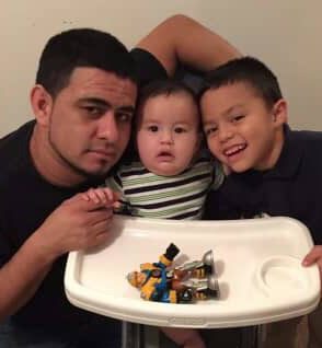 Sophomore Dilan Posada and his brother pose together for a photo with their dad. Posada was only 7 years old when his father was murdered by a friend. (photo contributed by Posada)