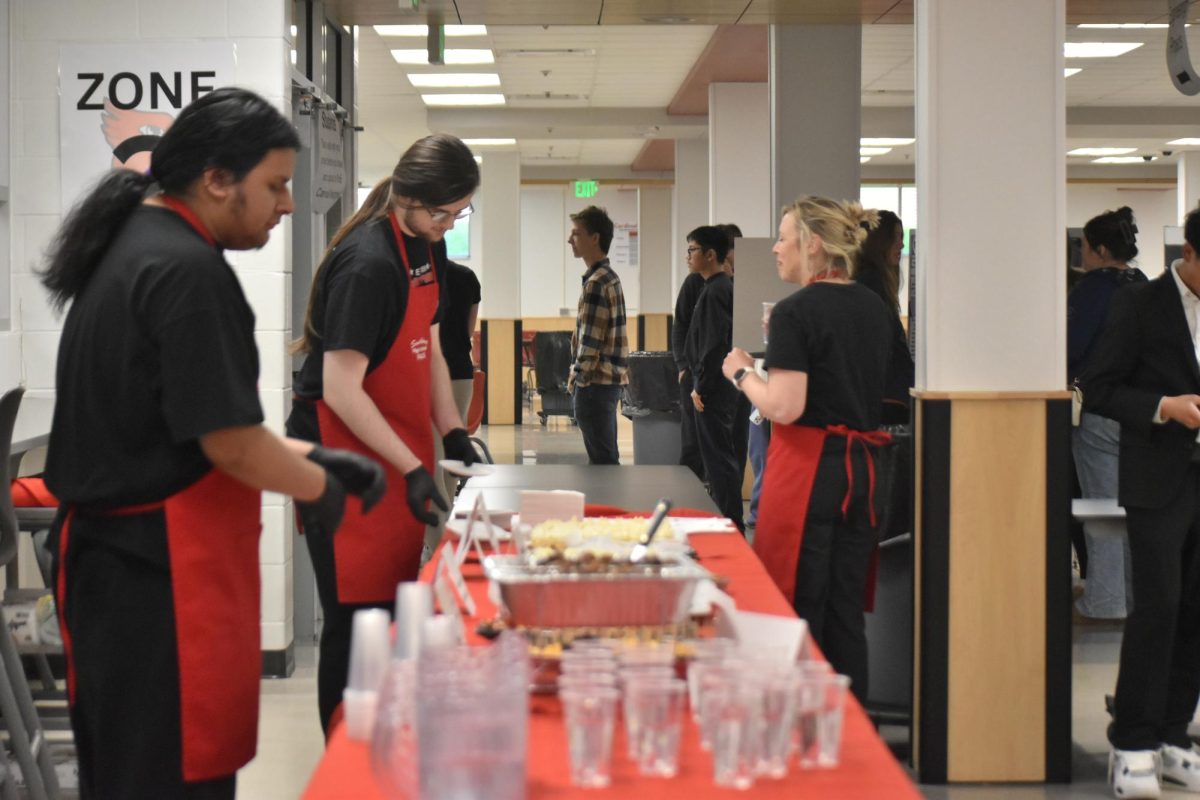 Culinary students help out at the function. They served the guests and students food throughout the evening. 
