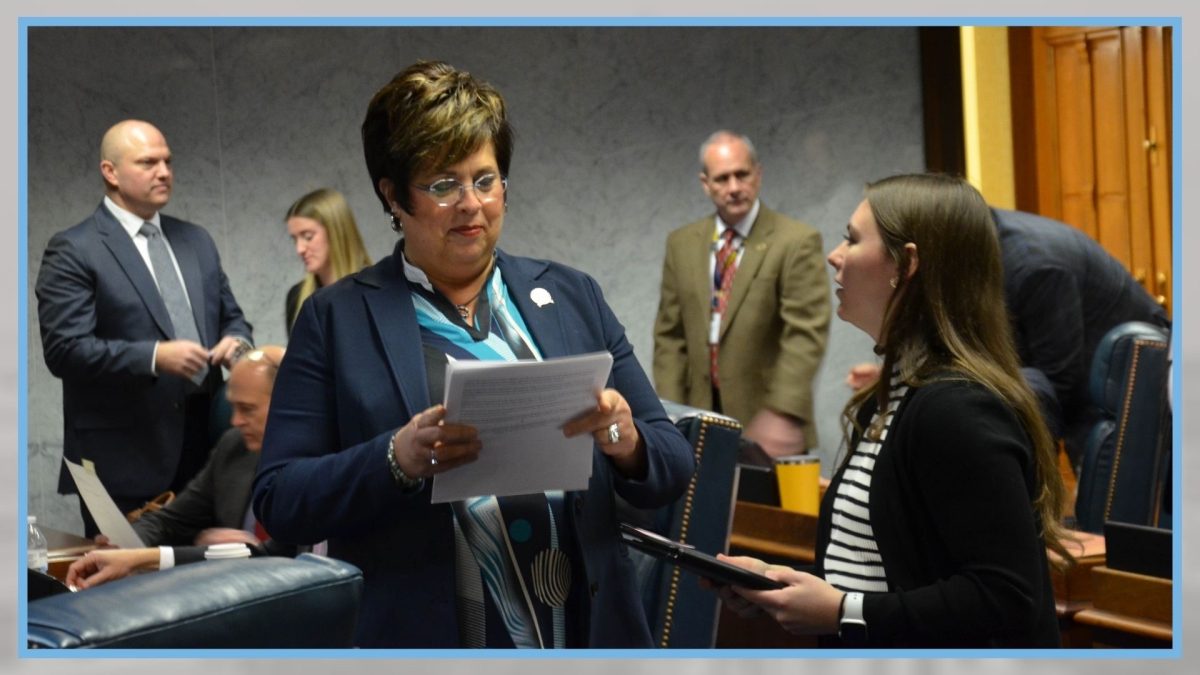 SHS alumna Emily Mertz (right) discusses the work she had compiled for Senator Donato. She was a Press Secretary Intern at the time, a job in which she was offered during her junior year of college at IU. (photo contributed by Mertz)
